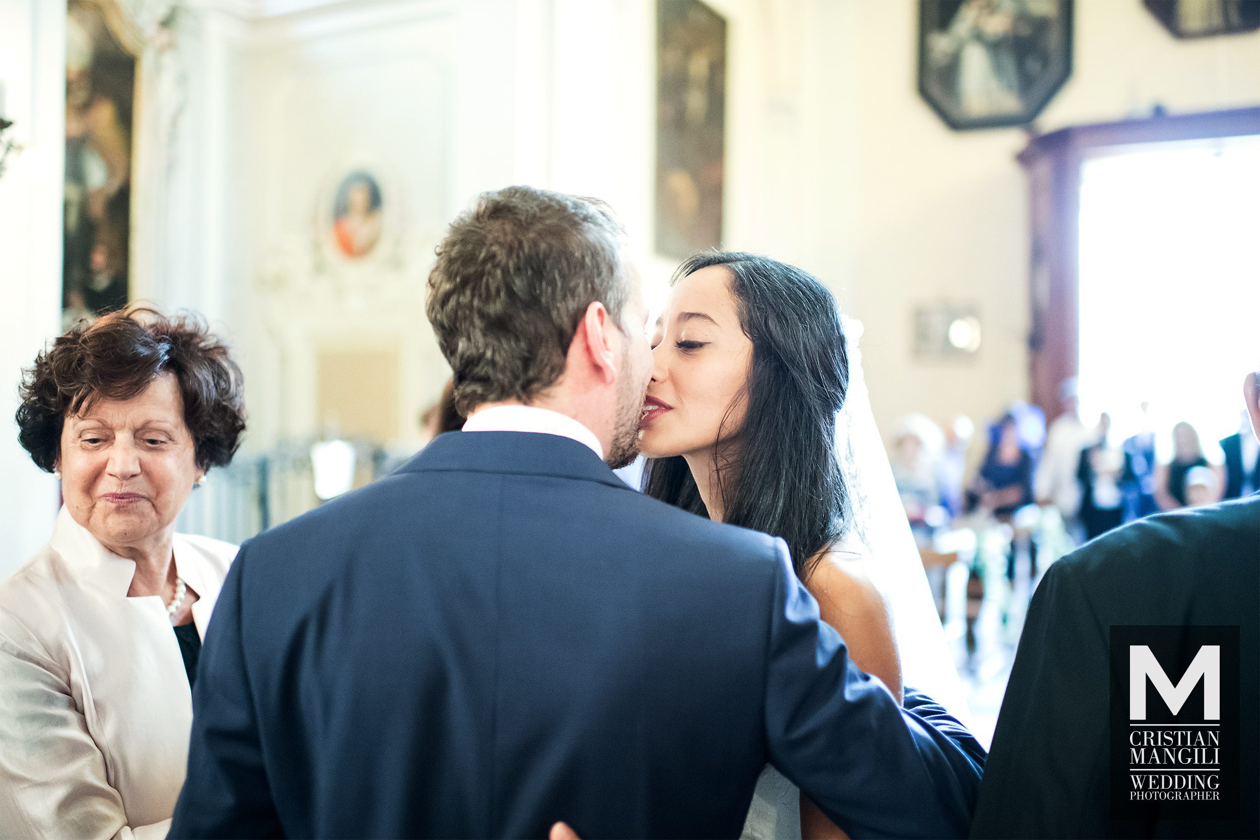 025 wedding photographer lake como italy kissing in church 025 wedding photographer lake como italy kissing in church