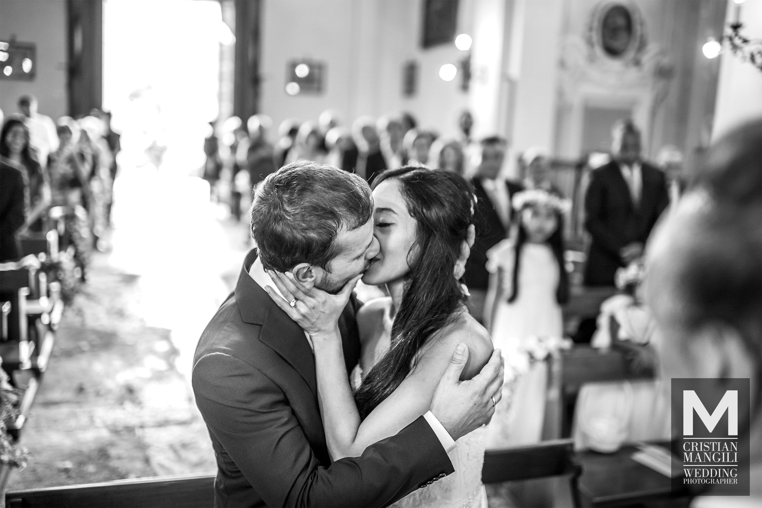 027 wedding photographer lake como italy kissing in church 2 027 wedding photographer lake como italy kissing in church 2