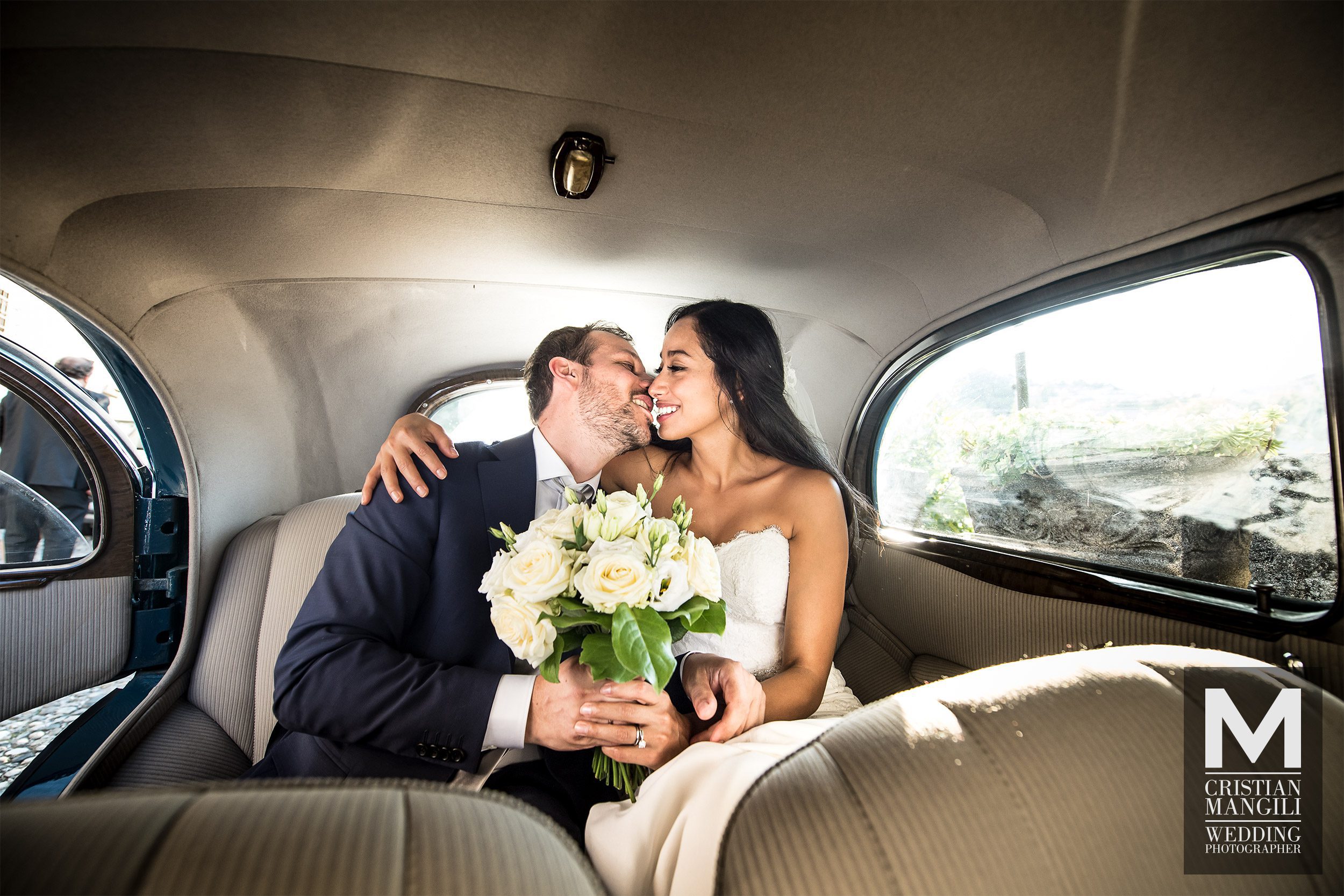 034 wedding photographer lake como italy just married kissing inside car 034 wedding photographer lake como italy just married kissing inside car