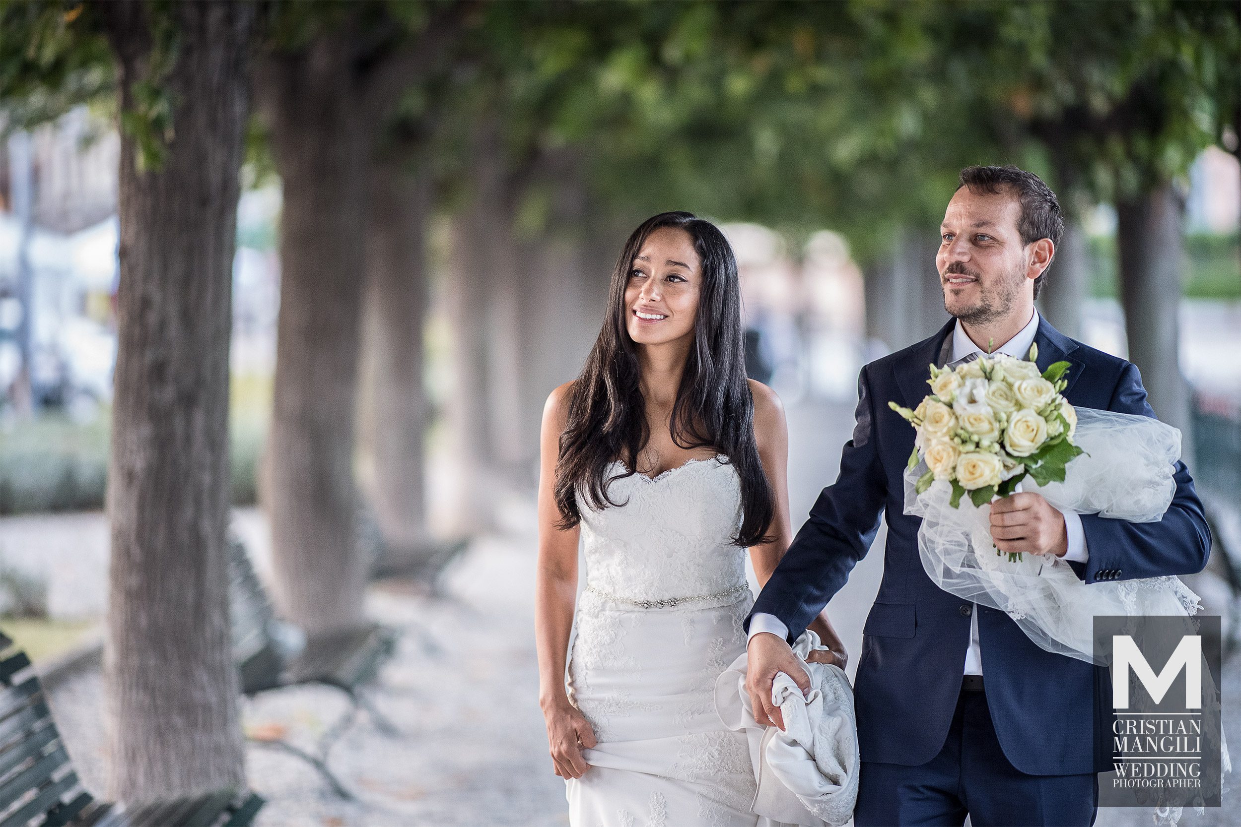 060 wedding photographer lake como italy groom walking under trees 060 wedding photographer lake como italy groom walking under trees