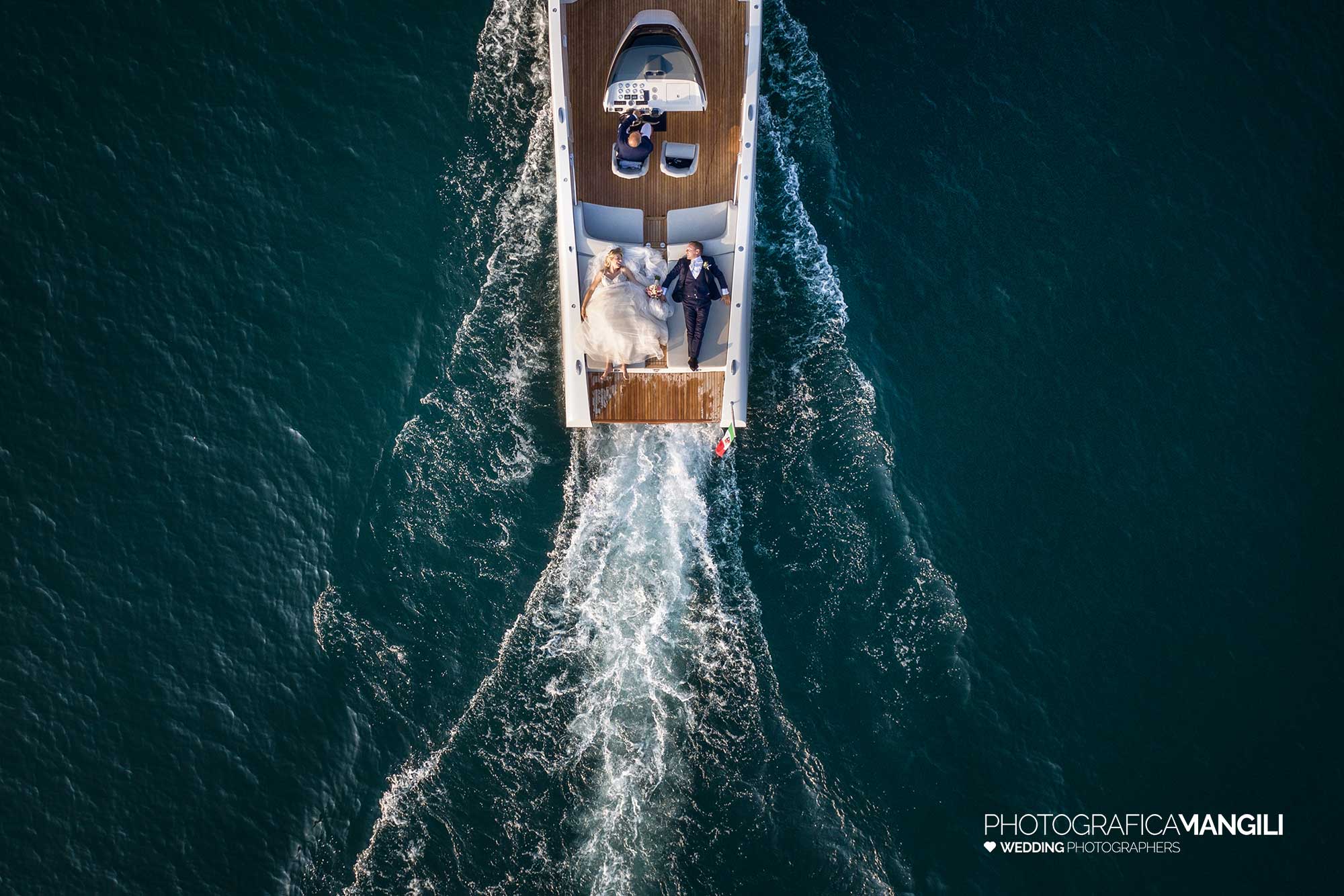 015 newlyweds relax boat garda lake drone 1 015 newlyweds relax boat garda lake drone 1